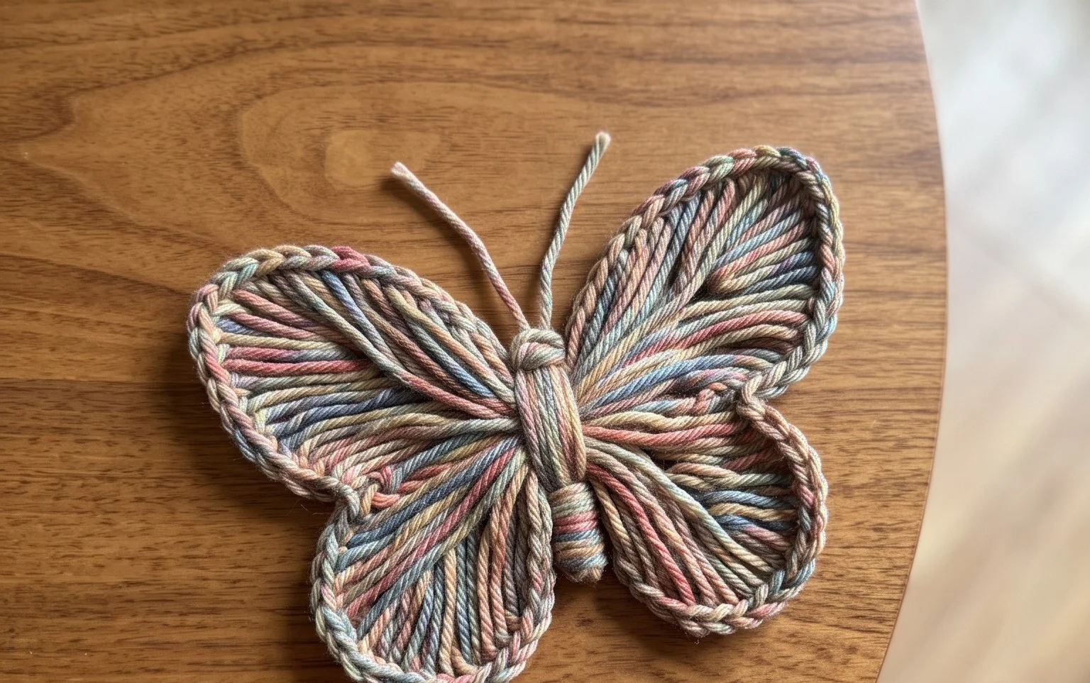 How to make a yarn butterfly craft